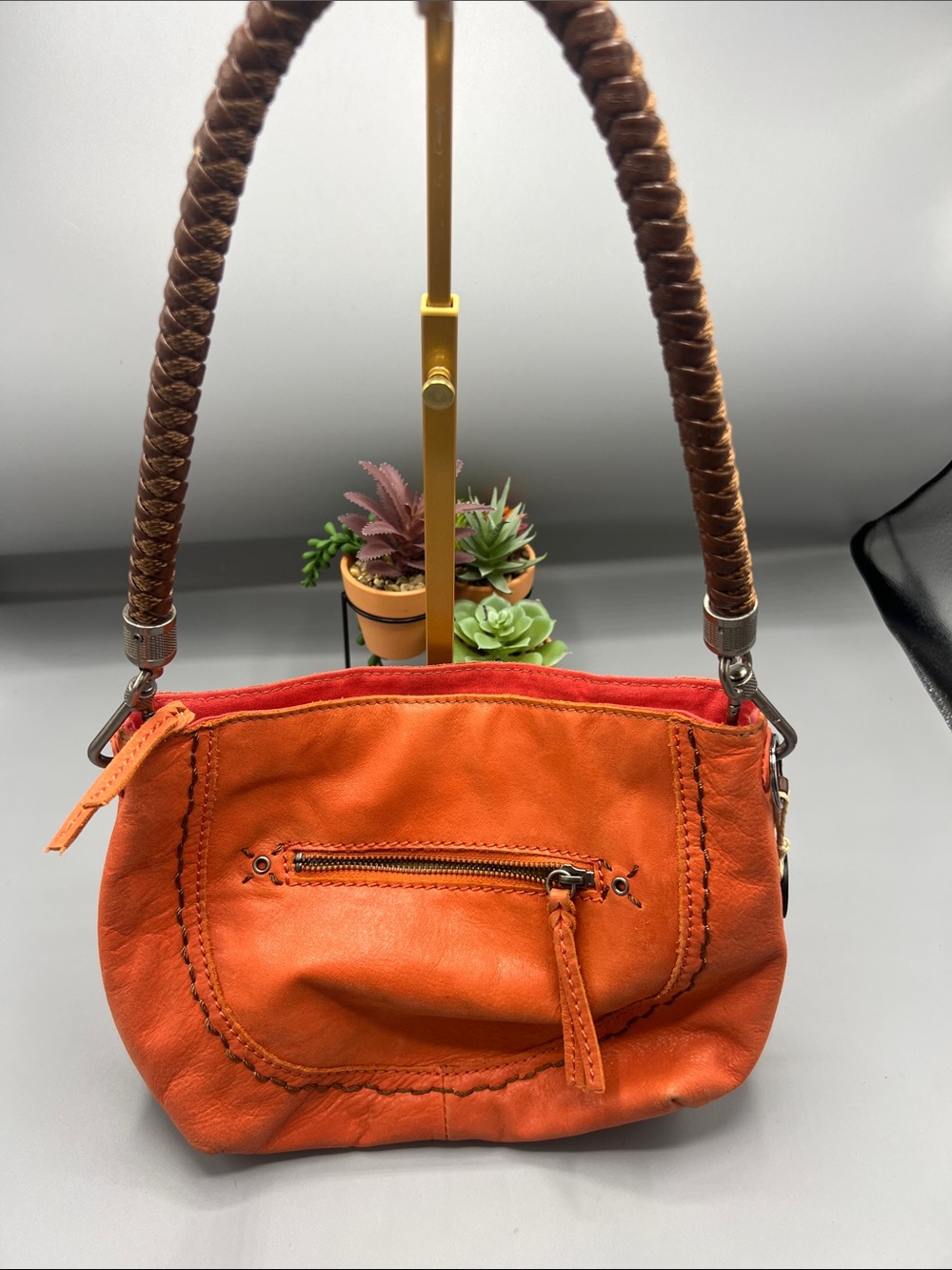 The Sak Indio Hobo Cayenne orang
Coral Leather Purse Woven
Leather Braided Strap